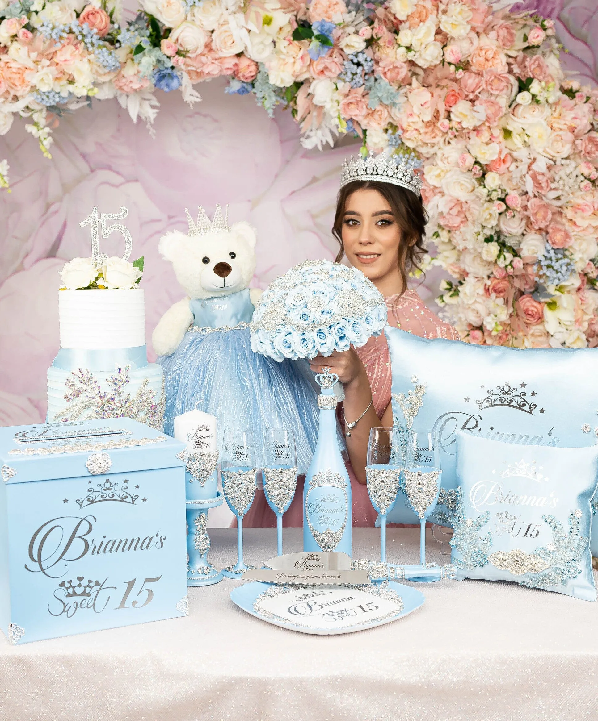 Light blue quinceanera brindis package with bottle and candle